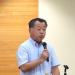 挨拶する澤田精一会長
